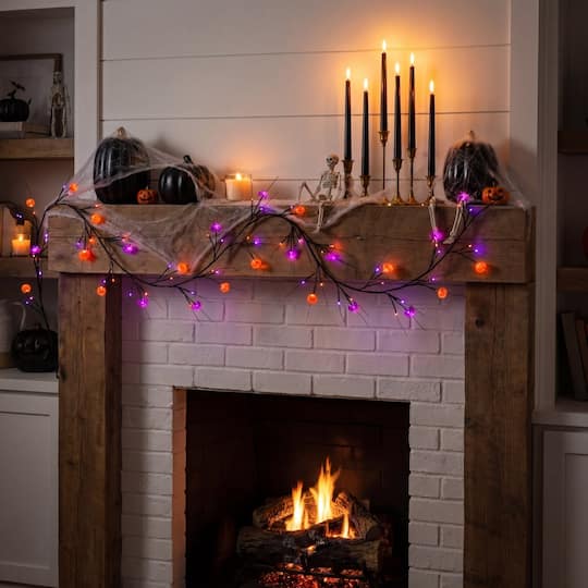 6.5ft. Artificial Halloween Twig Garland with 57 Orange and Purple LED Lights